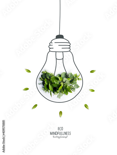 Energy saving eco lamp, made with green sprout and leaves,isolated on white background. LED lamp with green leaf. Minimal nature concept.Think Green.Ecology Concept. Environmentally friendly planet.