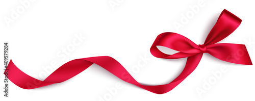 Decorative red bow with long red ribbon isolated on white background. Holiday decoration for Christmas or  Valentines day sale design. Vector stock illustration	