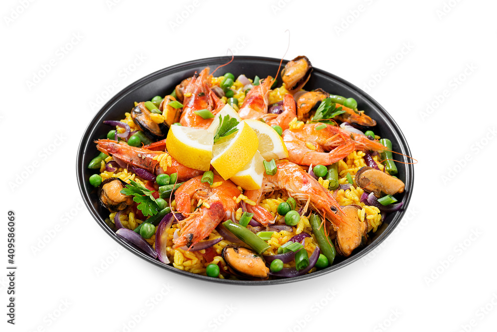 Traditional spanish seafood paella in the fry pan isolated on white background