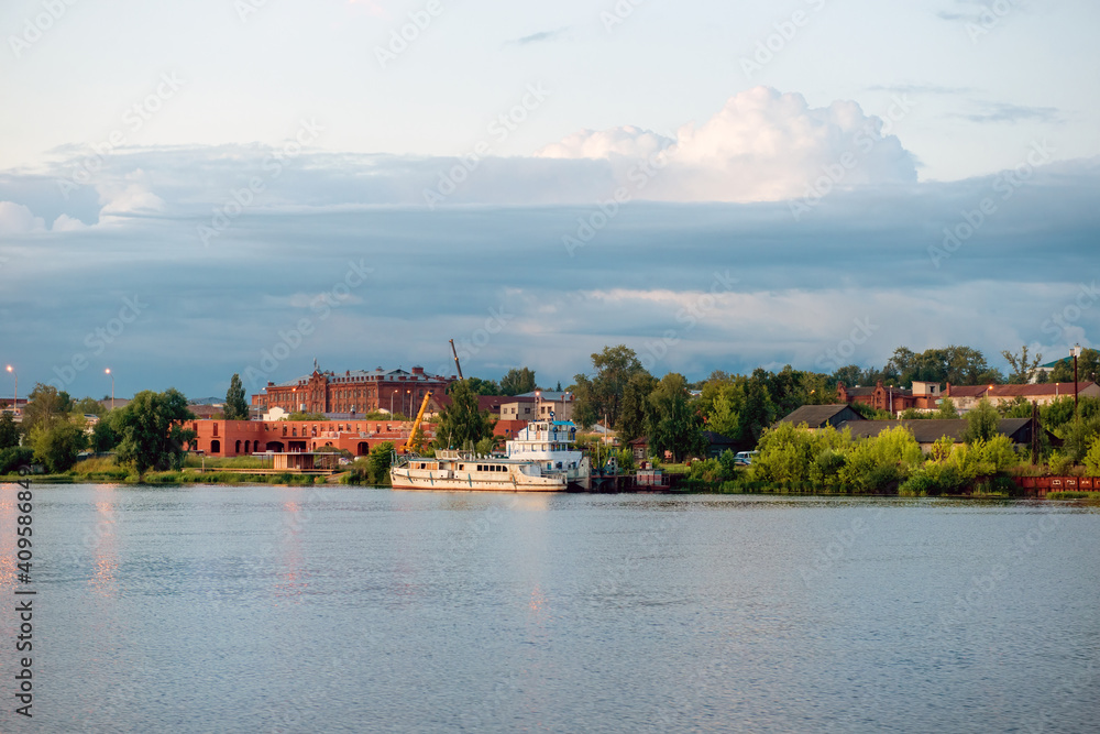 Factory district of the city of Kostroma on a summer evening at sunset