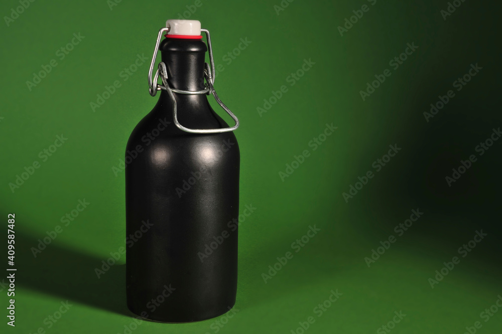ceramic bottle on green background ceramic bottle on green background