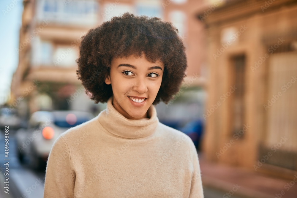 Young hispanic girl smiling happy standing at the city. Young hispanic girl smiling happy standing at the city.