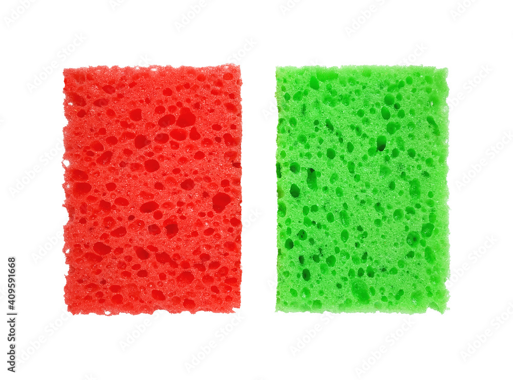 Red and green rectangular porous washing sponges isolated on a white background Red and green rectangular porous washing sponges isolated on a white background