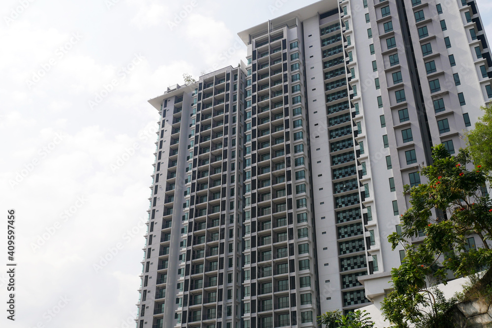 SELANGOR, MALAYSIA -JULY 22, 2020: High rise apartment building with modern facade design. Popular in the urban areas in Malaysia. Various facilities for the use of the residents are provided.
