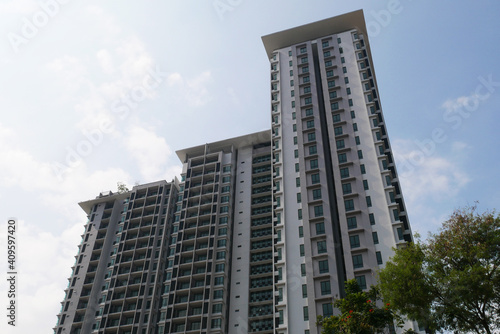 SELANGOR, MALAYSIA -JULY 22, 2020: High rise apartment building with modern facade design. Popular in the urban areas in Malaysia. Various facilities for the use of the residents are provided.