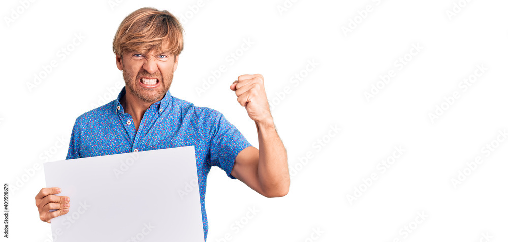 Handsome caucasian man with beard holding sale poster annoyed and frustrated shouting with anger, yelling crazy with anger and hand raised Handsome caucasian man with beard holding sale poster annoyed and frustrated shouting with anger, yelling crazy with anger and hand raised