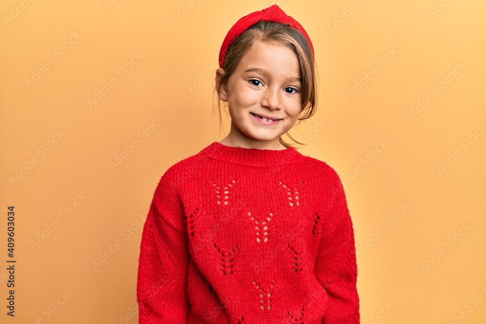 Little beautiful girl wearing casual winter sweater with a happy and cool smile on face. lucky person. Little beautiful girl wearing casual winter sweater with a happy and cool smile on face. lucky person.