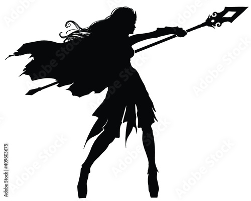 Fototapeta The black silhouette of a graceful sorceress girl standing in a casting pose , her cloak and hair swaying in the wind, she has the thin, fragile legs of an elf