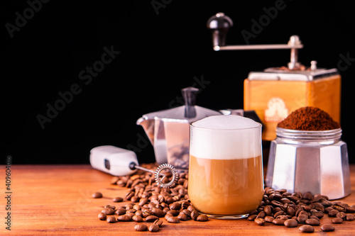 Fresh cafe for refresh caffeine white cup roasted organic coffee bean farm in vintage wood grinder classic metal coffee pot for black espresso and glass cream foam milk cappuccino latte