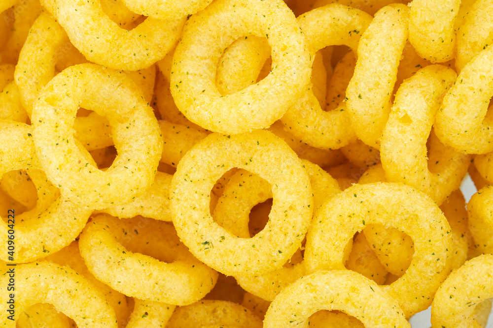Beer snacks. Background of corn rings of sticks with cheese and green onion flavor. Beer snacks. Background of corn rings of sticks with cheese and green onion flavor.