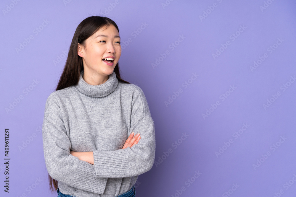 Young asian woman over isolated background happy and smiling Young asian woman over isolated background happy and smiling
