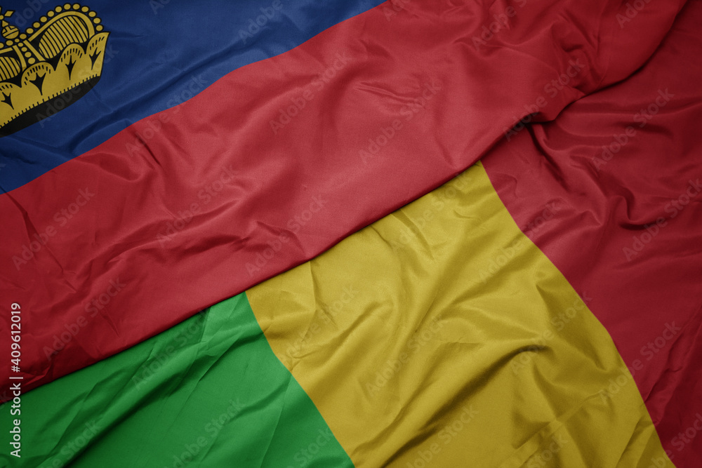 waving colorful flag of mali and national flag of liechtenstein. waving colorful flag of mali and national flag of liechtenstein.