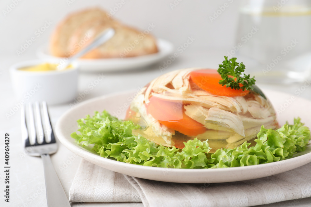 Delicious chicken aspic served on light table, closeup Delicious chicken aspic served on light table, closeup