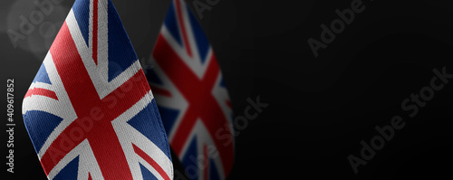 Small national flags of the United Kingdom on a dark background