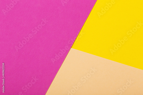 background from colored sheets of cardboard top view