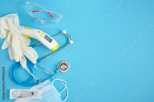 medical equipment on blue background place copy top view