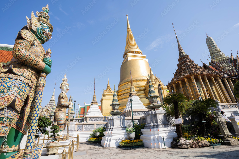Giant statue at Temple Wat Pra Kaew, famous tourist destination of Bangkok..