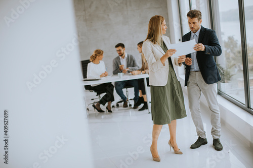 Man and woman discussing wi...