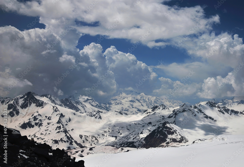 A view of the ever-snow-covered mountains from the slope of Elbrus.