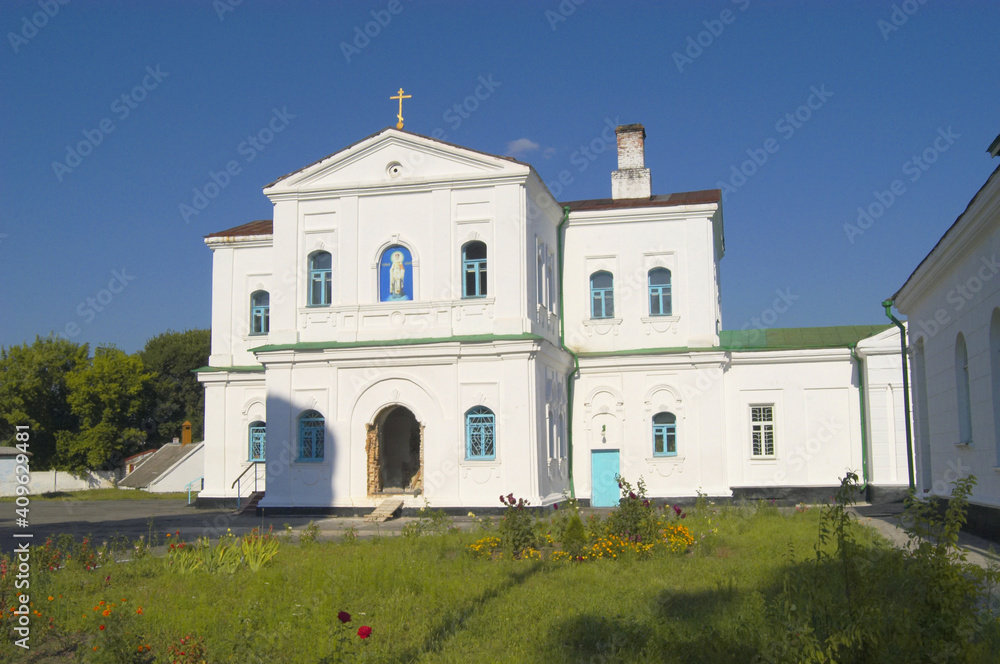 Nikolaevsky (Mykolayivsky) monastery against blue sky