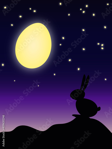 Fototapeta Naklejka Na Ścianę i Meble -  Hase an Ostern der den Mond in Form eines Ei am Himmel beobachtet und dabei auf einem Hügel in der Landschaft sitzt