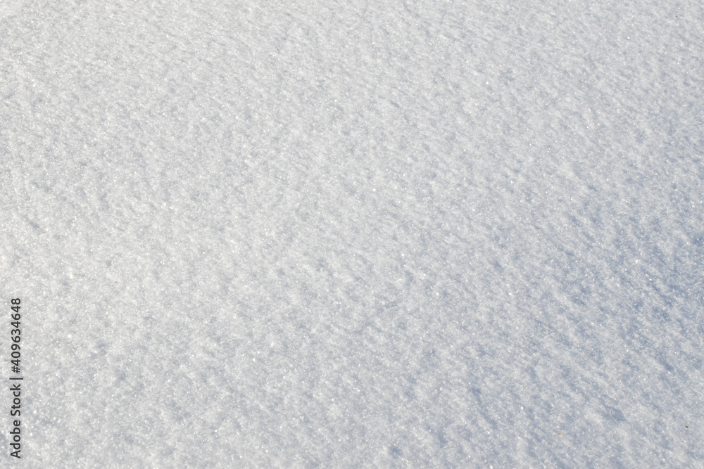 White snow texture on clear day. Winter background. Snow drifts. white snowflakes background, rough pattern of snow texture White snow texture on clear day. Winter background. Snow drifts. white snowflakes background, rough pattern of snow texture