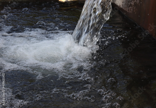 Wallpaper Mural Water flows out of the well in rural areas of India Torontodigital.ca