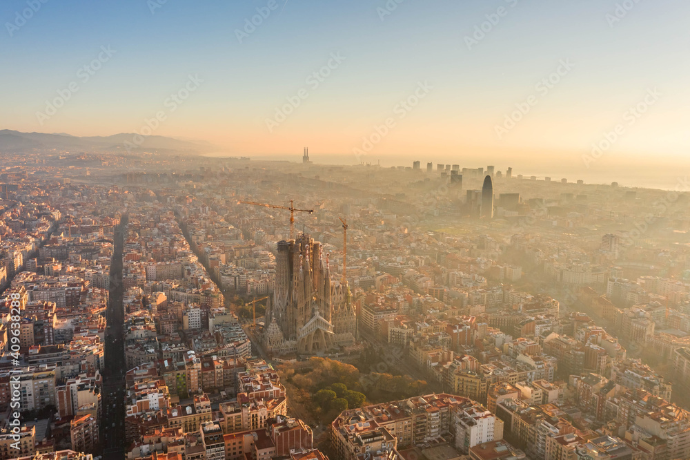 Aerial drone shot of sunrise over Barcelona city center in early morning Aerial drone shot of sunrise over Barcelona city center in early morning