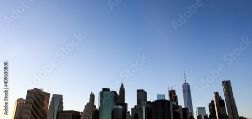 Lower Manhattan skyline view from brooklyn heights promenade at sunset
