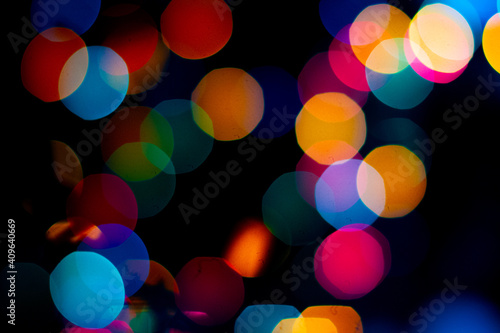 Bokeh christmas lights defocused on black background