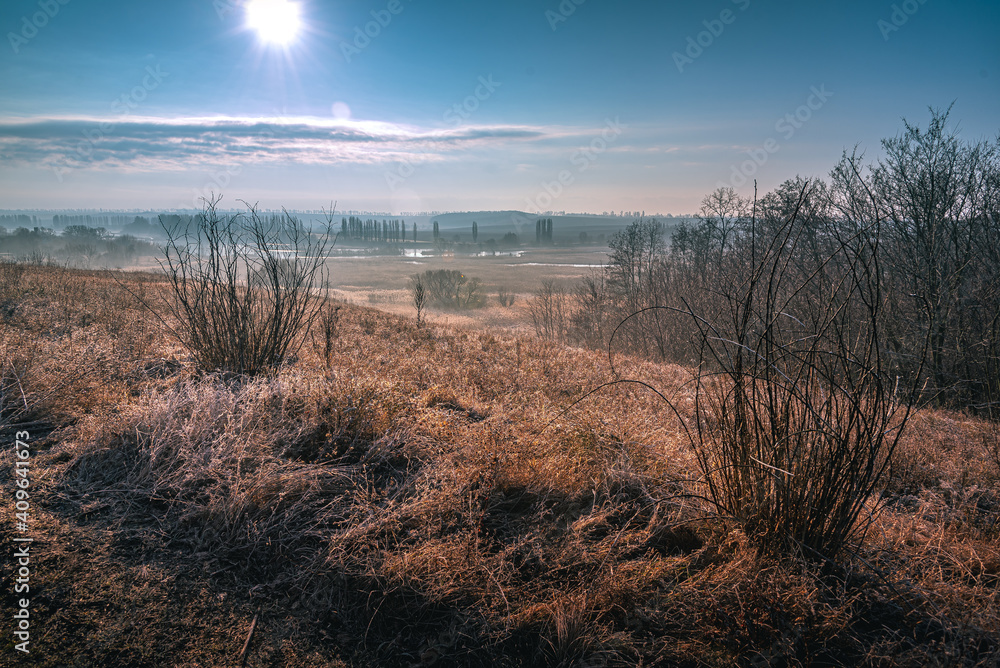 Obraz premium Winter moring among fields