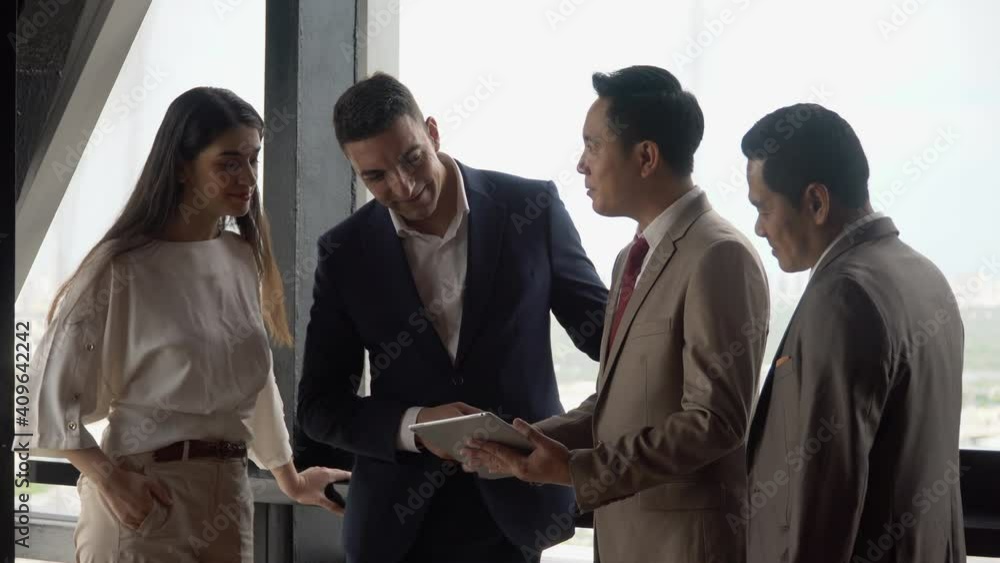 Group of diversity Business people handshake to celebrating victory of achieving goals and dealing success in meeting room on window in office over building cityscape Group of diversity Business people handshake to celebrating victory of achieving goals and dealing success in meeting room on window in office over building cityscape