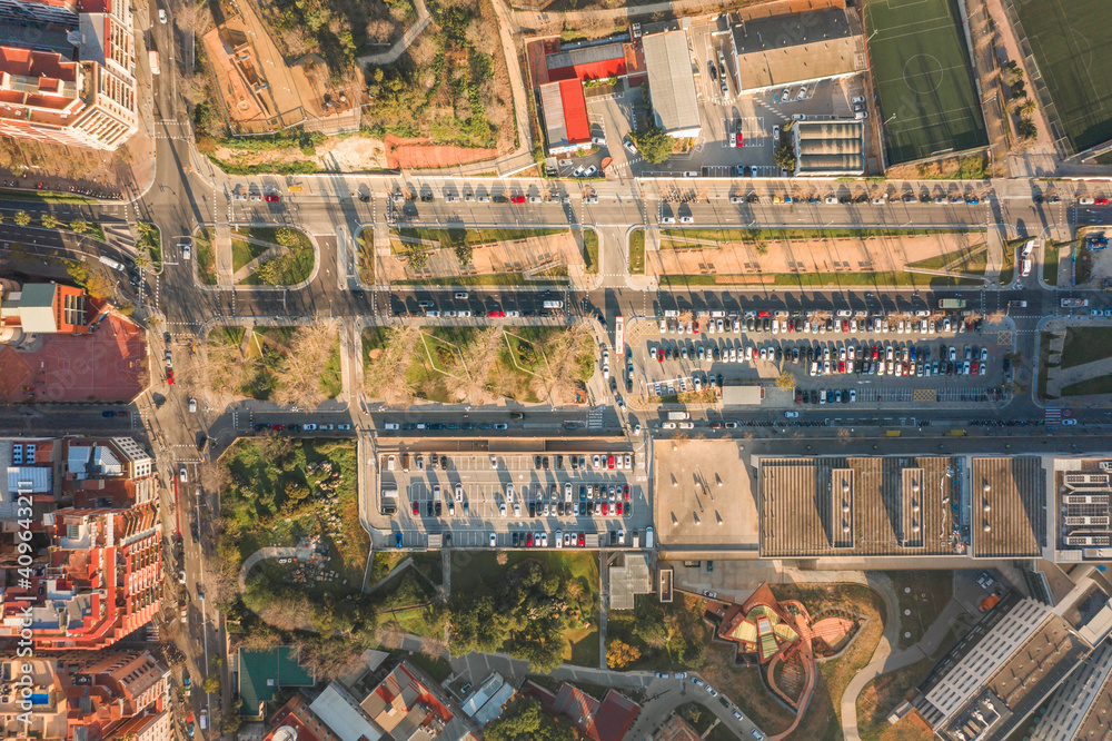 Aerial overhead drone shot of parking lot near Turo de la Rovira in Barcelona morning Aerial overhead drone shot of parking lot near Turo de la Rovira in Barcelona morning