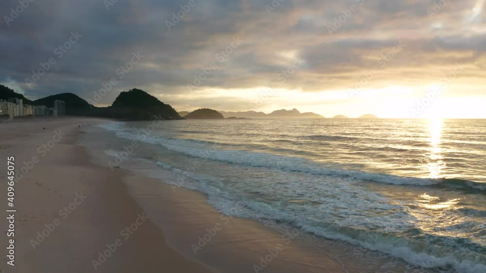 Aerial view of Copacabana beach in Rio de Janeiro at sunrise. Brazil. Big waves on Copacabana beach