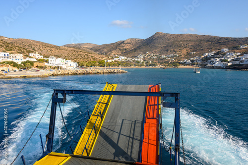 Ferry departing the island of Sikinos in the Aegean Sea. Cyclades, Greece