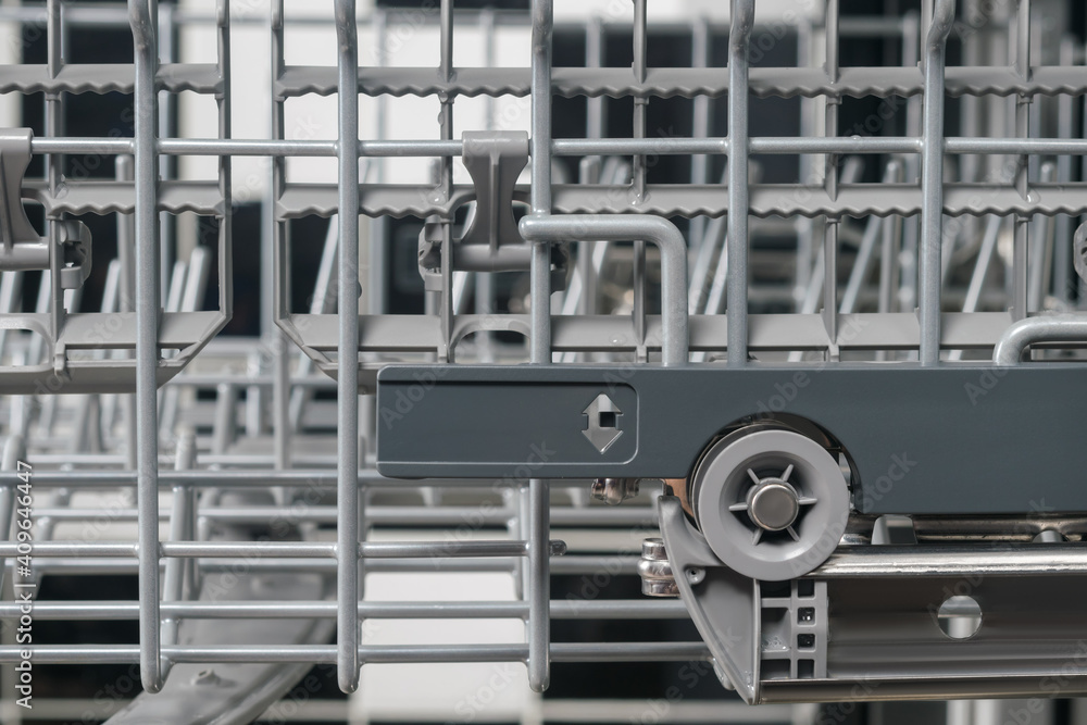pull-out mechanism of the dishwasher basket, close-up view pull-out mechanism of the dishwasher basket, close-up view
