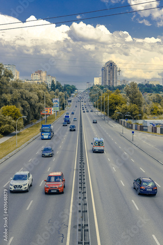 Intercity highway with car traffic. Brest-Litovsk highway in Kyiv, Ukraine