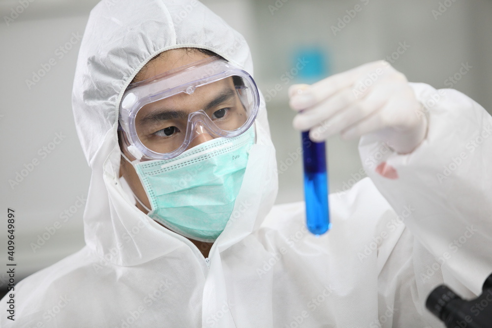 Laboratory research. Team work Scientists study data and evaluating microscope success. they are doing research with dropper chemical testing life science and find vaccine for covid 19 Laboratory research. Team work Scientists study data and evaluating microscope success. they are doing research with dropper chemical testing life science and find vaccine for covid 19