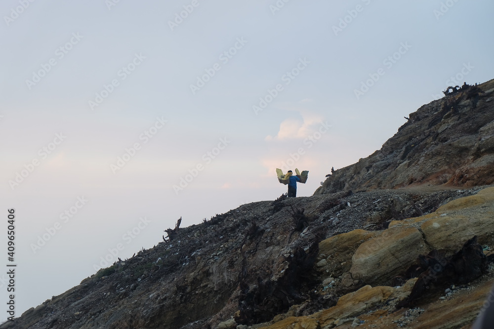 sulphur miners on top of the mountain