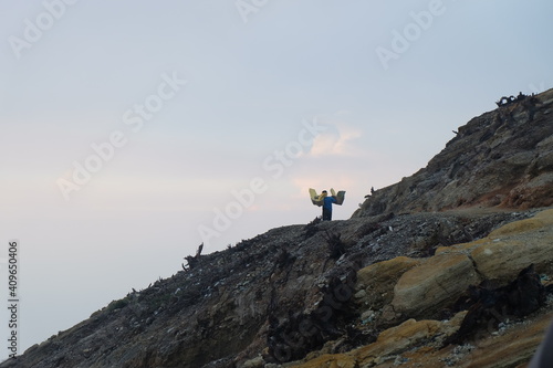 sulphur miners on top of the mountain