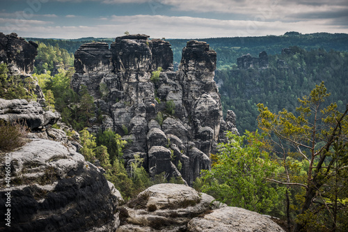 The Bastei is a rock formation towering above the Elbe River in the Elbe Sandstone Mountains of Germany. photo