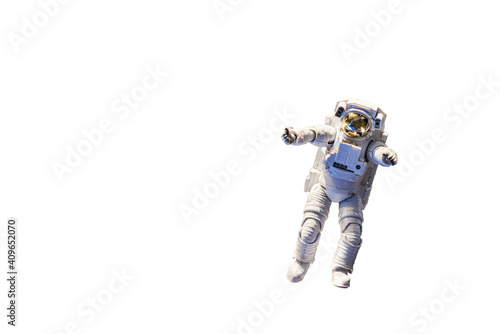Statue or plastic model astronaut or spaceman isolated on white background with clipping path