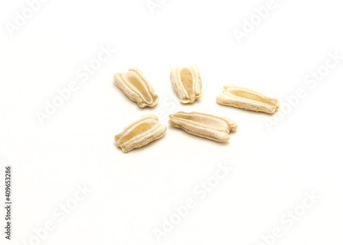 Five opo gourd or calabash squash seeds isolated on white background