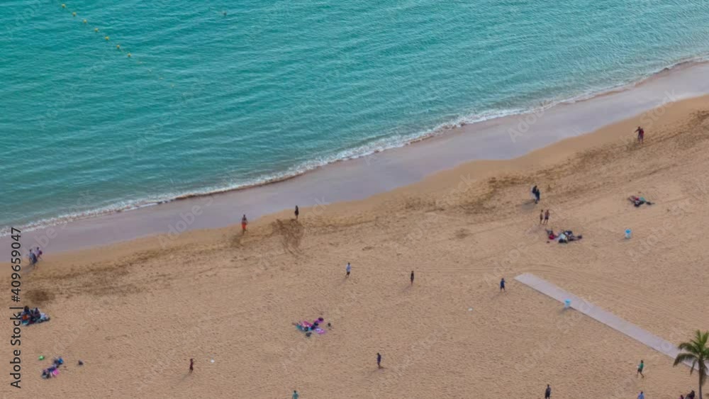 Aerial timelapse of people on Teresitas beach, Tenerife, Canary islands, Spain Aerial timelapse of people on Teresitas beach, Tenerife, Canary islands, Spain