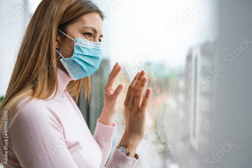 Woman wearing medical face mask against the corona virus, covid-19. Quarantine, isolation concept.
