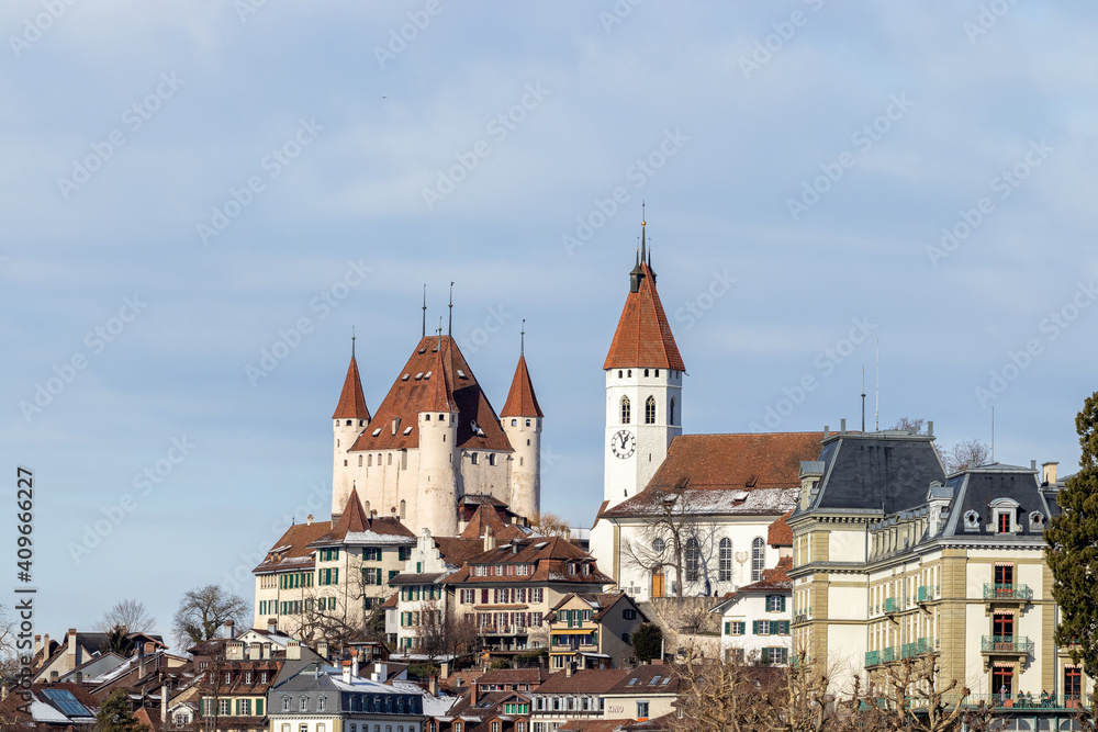 Historical thun city old town skyline with castle and church on sunny day, canton bern switzerland.