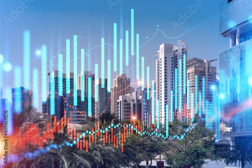Panoramic view of steel and glass skyscrapers of Dubai Marina. Modern cityscape of the capital of the UAE. Financial services hub. FOREX graph and chart concept. Double exposure. © VideoFlow