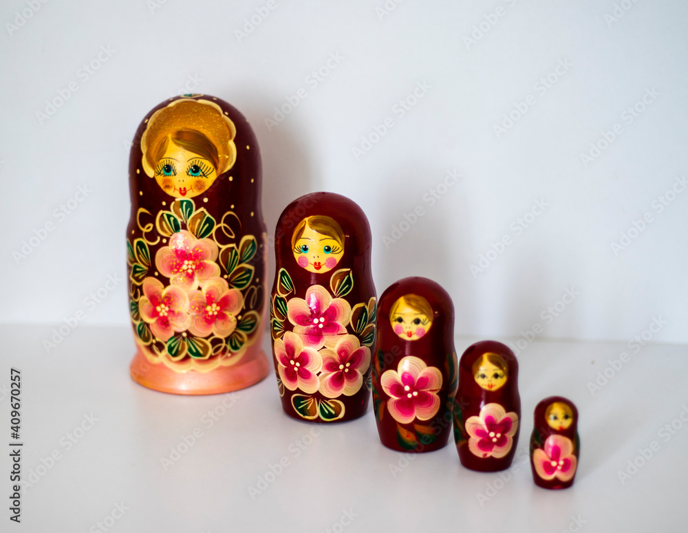 Close up shot of set of a traditional russian wooden doll. Indoors