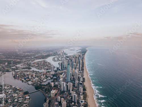 Aerial view of city buildings near body of water