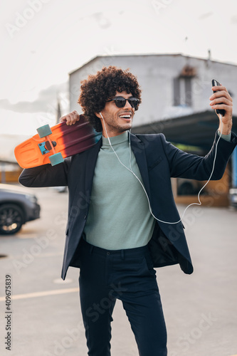 handsome man with skateboard